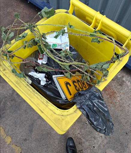 Used spill kit absorbents and contaminated waste materials collected together, representing hazardous spill management and safe disposal practices.
