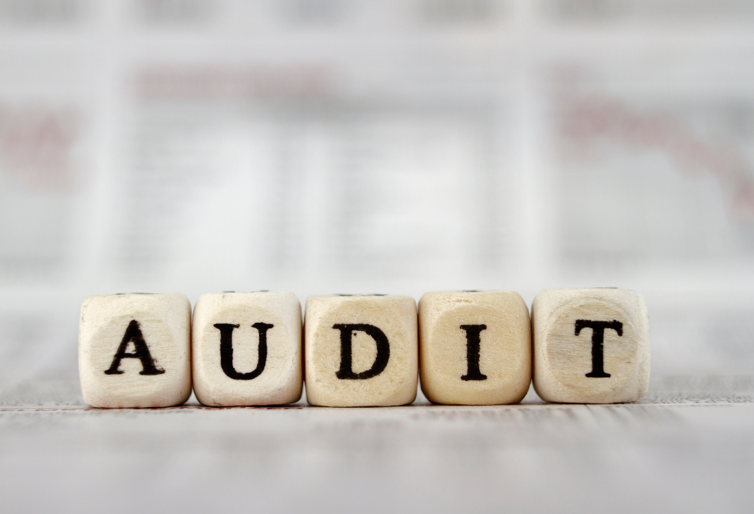 Image of small blocks spelling out AUDIT to represent the ISO 14001 audit