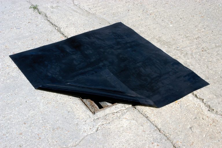 Drain Protection Kits drain cover positioned over a surface drain to prevent hazardous spills entering drainage systems.